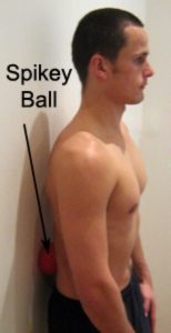 Spikey ball - Lower back release standing